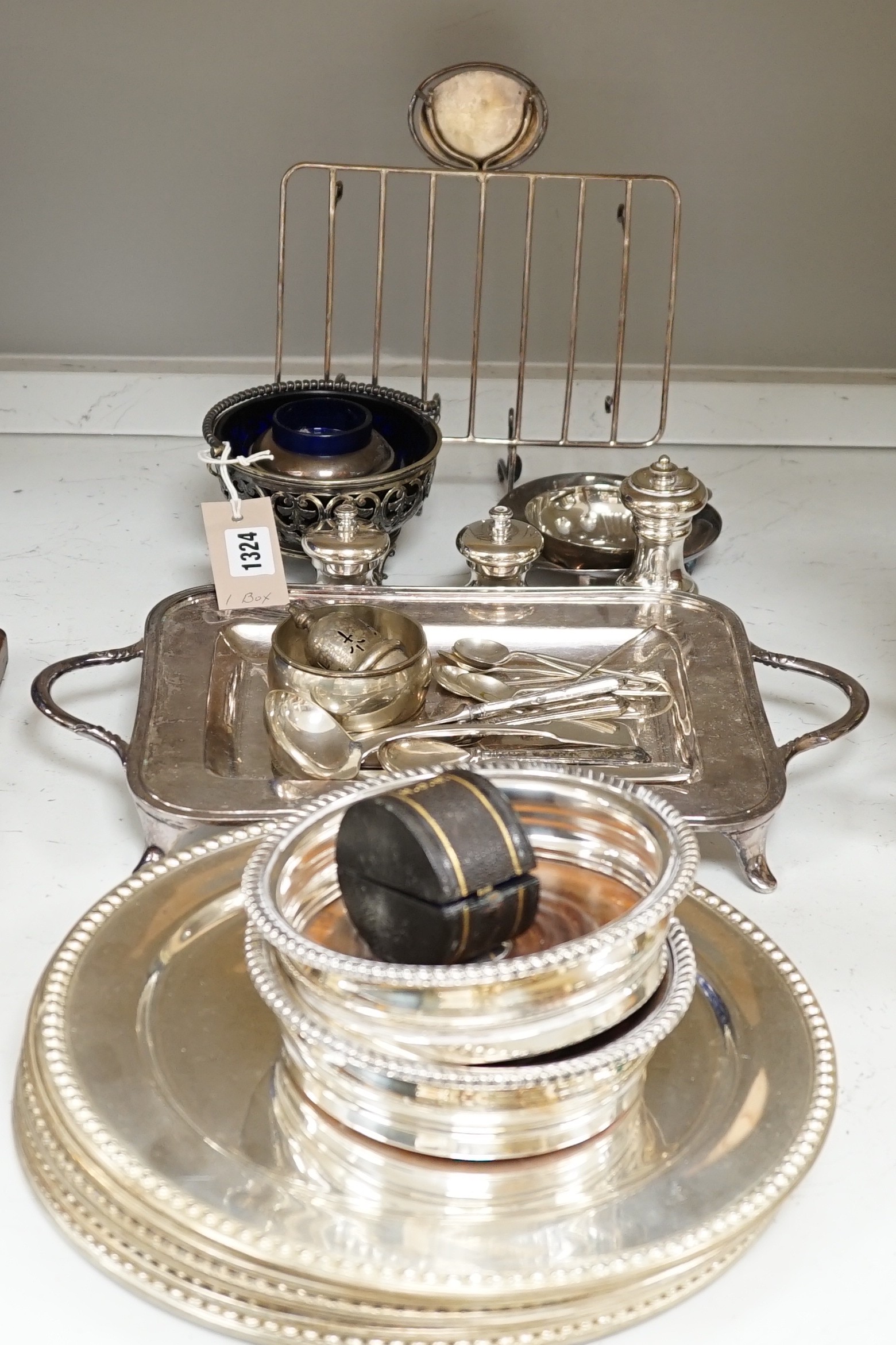 A pair of plated coasters, a set of eight plated dishes and other plated ware